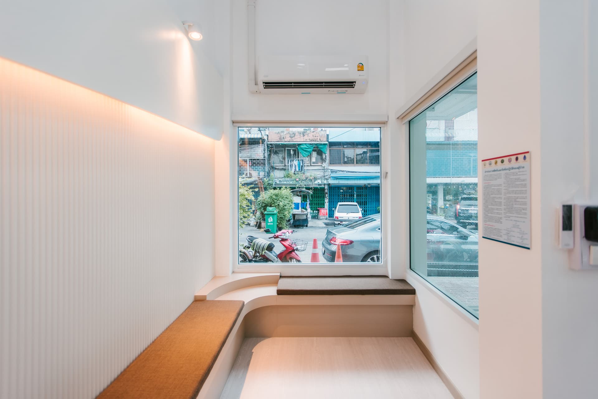 Clinic hallway with bench seating area
