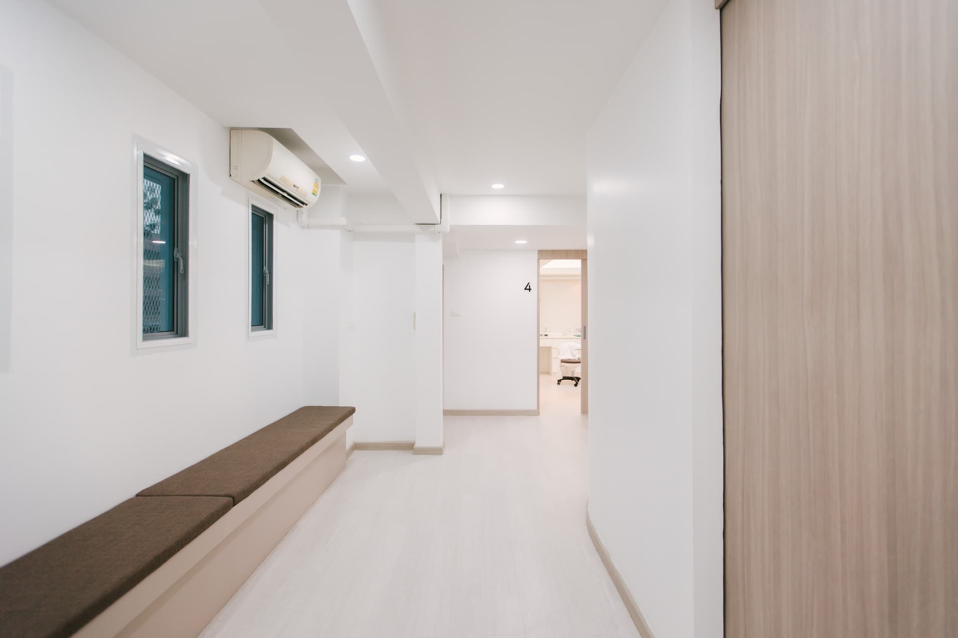 Waiting corridor with cushioned bench