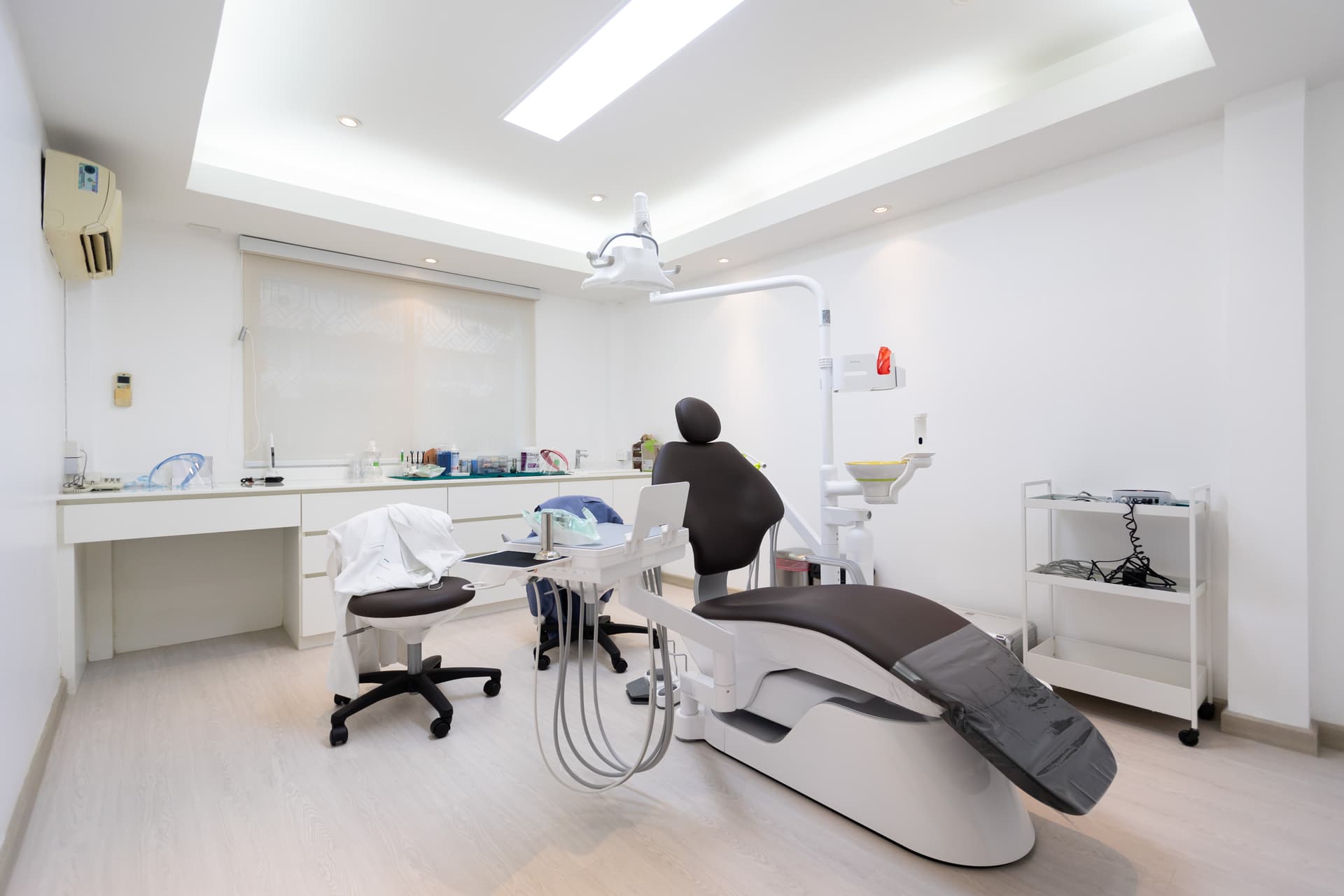 Clean white corridor with room numbers