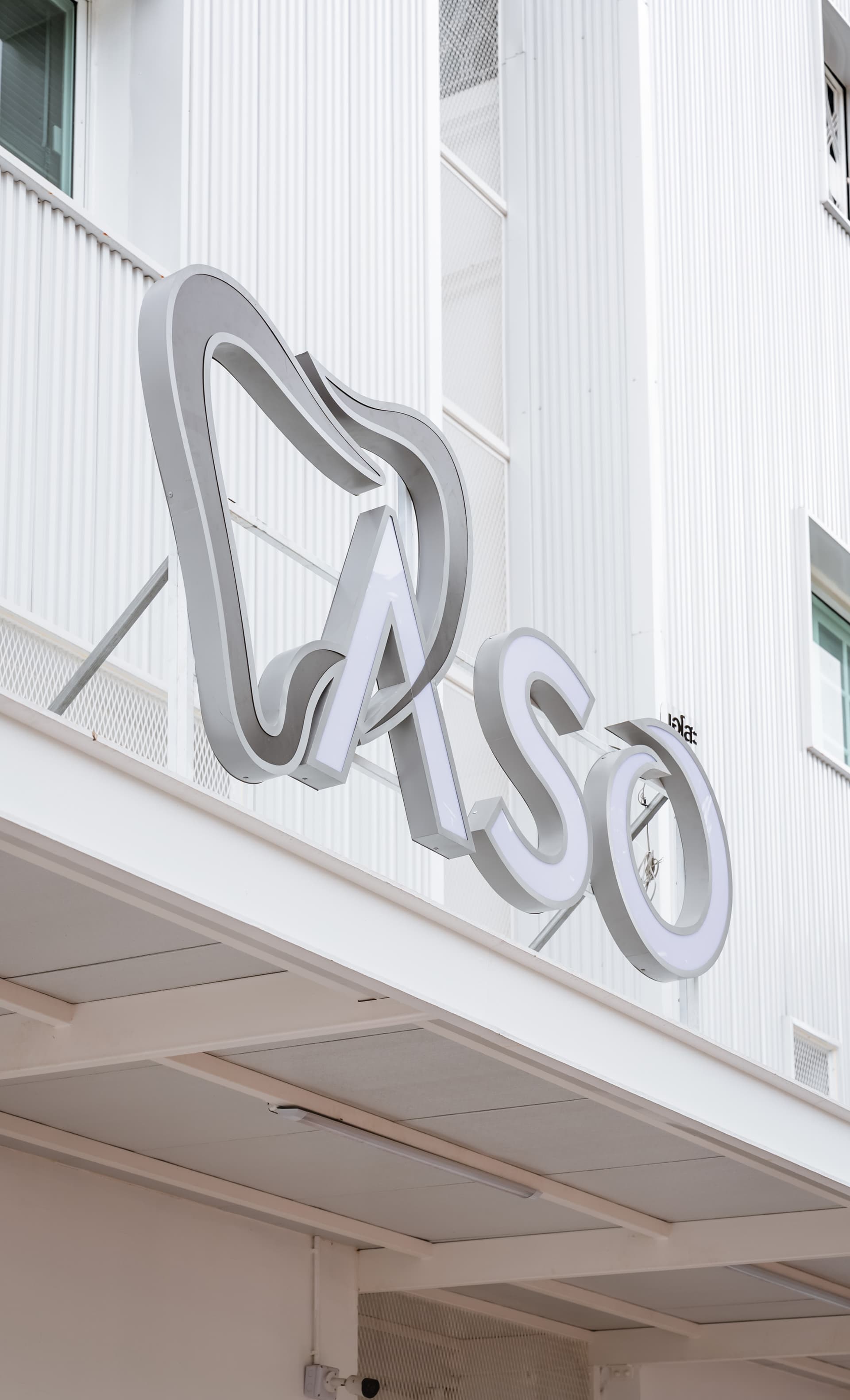 Patient undergoing panoramic X-ray scan